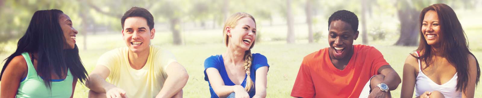 young adults smiling and laughing outside